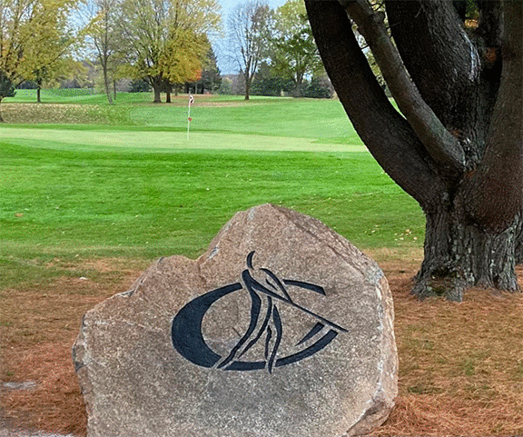 Stone with course logo